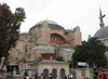 The Hagia Sofia (Church of the Holy Wisdom) in Istanbul is a former Christian Greek Orthodox cathedral, later an Ottoman imperial mosque, and now a museum. Completed in A.D. 537, it was the world's largest building and an engineering marvel of its time, chiefly renowned for its vast dome. It is considered the epitome of Byzantine architecture.
