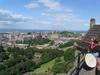 A view of Edinburgh from its castle. The Firth of Forth, the estuary of Scotland's Forth River, may be seen in the background.