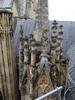 Some of York Minster's decorative roof finials show severe weathering, as well as areas where restoration has taken place.
