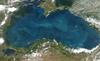 Swirls of color ranging from deep olive green to bright turquoise were created by a massive phytoplankton bloom that covered the entire surface of the Black Sea on this image taken 20 June  2006. Many of Europe's largest rivers, including the Danube, the Dnister, and the Dnipro (Dnieper) dump fresh water into the sea. The sea's only source of salty water is the narrow Bosporus Strait (in the southwest), which connects it to the Mediterranean Sea through the Sea of Marmara. The diamond-shaped landmass that projects into the sea from the north is Ukraine's Crimean peninsula. Photo courtesy of NASA.