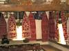 Embroidered towels, icons, and drying herbs and flowers decorate the interior of a peasant home at the Museum of Folk Architecture and Life in Pyrohiv, south of Kyiv. 