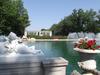 The one-acre (0.4 hectare) Reflecting Pool at the foot of the Long Walk at Nemours Gardens, Wilmington, Delaware features 157 jets shooting water 12 ft (3.5 m) into the air. When they are turned off, the entire Long Walk is reflected in the pool. The pool, 5.5 ft (1.7 m) deep at its deepest section, holds 800,000 gallons (3.028 million liters) of water and takes three days to fill. 