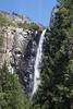 Bridalveil Falls is often the first waterfall seen by tourists coming into Yosemite Valley in California, it drops 189 m (620 ft) into the valley. The falls run all year, roaring during the spring runoff and appearing as a windblown "bridal veil" during the rest of the year.
