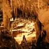Stalactites and stalagmites, made of travertine, can be seen on the Frozen Niagara tour of Mammoth Cave in Kentucky. Travertine, or traveling stone, is made of limestone that has crystalized out of dripping water. Image courtesy of the US National Park Service.