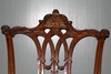 A detail of the actual chair George Washington sat in while presiding over the Constitutional Convention in 1787. At the signing, Benjamin Franklin was optimistic about the document and said that now he had the happiness to know that the carving on the back was a rising, not a setting sun. Photo courtesy of the US National Park Service.