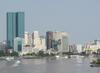 View of Ho Chi Minh City (aka Saigon) from the Saigon River. Saigon is Vietnam's major port and, with 8 million inhabitants, its largest city. It was called Saigon until 1975 when it was renamed Ho Chi Minh City following its capture by North Vietnamese communist forces. Although the city's commercial core is officially called Saigon, the entire city is widely referred to as Saigon even in the North. The city was architecturally influenced by the French during their colonial occupation of Vietnam. Numerous classical Western-style building in the city reflect this, so much so that Saigon was referred to as "The Pearl of the Far East" or "Paris in the Orient." In more recent years, a building boom has transformed the skyline of the city. 