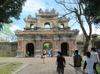 Gate leaving the grounds of the former Imperial City in Hue. Located on the Perfume River in central Vietnam, Hue was the capital of Vietnam from 1802 until 1945. A walled citadel, 2 km by 2 km, as well as a moat, surrounded the city. Inside the citadel was the Imperial City. Many of the buildings of the Imperial City were destroyed during the Vietnam War. Some reconstruction has begun.