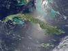 Satellite image of Cuba (center) and Jamaica (lower right). The southern tip of Florida, the Florida Keys, and the Florida Strait appear at the top. The bright blue green color around the islands, particularly around those of the Bahamas in the upper right, is likely due to the brighter solar reflection over the more shallow waters that surround the islands. Image courtesy of NASA. 